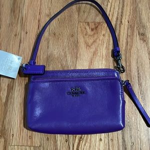 Brand new Coach Wristlet purple